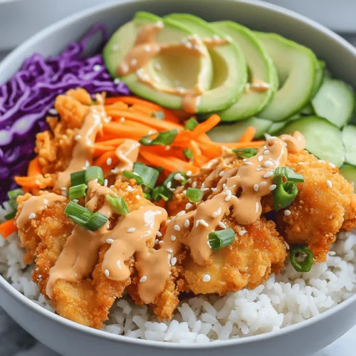 Are you in search of a vibrant, flavorful dish that can be whipped up quickly on a busy weeknight? Look no further than Bang Bang Chicken Bowls! This delightful recipe brings together tender chicken, a creamy and spicy sauce, and a colorful medley of fresh vegetables, all served over a bed of fluffy rice. The combination of textures and flavors makes it a satisfying meal that will please the whole family.