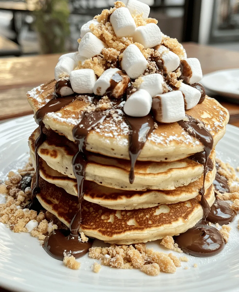Imagine waking up to a warm stack of pancakes that encapsulate the nostalgic flavors of a classic campfire treat—S'mores. These S'mores Pancakes are not just a breakfast item; they are an experience that brings together the sweet, gooey essence of toasted marshmallows, rich chocolate, and crunchy graham crackers, all nestled within a fluffy pancake. For breakfast lovers and dessert enthusiasts alike, this indulgent recipe transforms the simple act of eating pancakes into a delightful culinary adventure. With each bite, you’ll feel transported to a cozy campsite, reminiscing about joyful evenings spent around the fire, sharing stories and laughter.