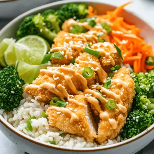 Bang Bang Chicken Bowls are an incredibly popular dish that has captured the hearts of food enthusiasts everywhere. This meal is not only visually appealing but also a symphony of flavors and textures that come together to create a satisfying dining experience. Imagine crispy chicken pieces nestled among a vibrant medley of fresh vegetables, all drizzled with a creamy, spicy sauce that tantalizes the taste buds. It’s a dish that balances crunch and creaminess, making it perfect for families looking for a weeknight dinner solution or meal prep enthusiasts aiming to whip up healthy and delicious lunches for the week ahead.